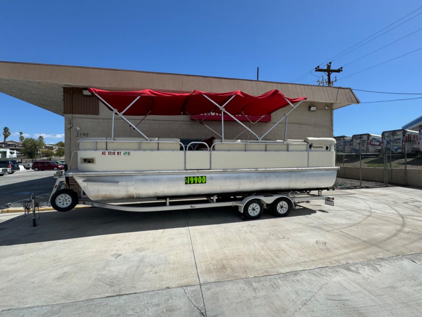 2005 White Voyager , located at 2190 Hwy 95, Bullhead City, AZ, 86442, (928) 704-0060, 0.000000, 0.000000 - 2005 Voyager Tritoon boat. red/white. double bimini tops. recently serviced. low hours. 215 hours. 5.0 220 hp mercruiser. 2 gas tanks. 2 new batteries. full winter cover . - Photo#1